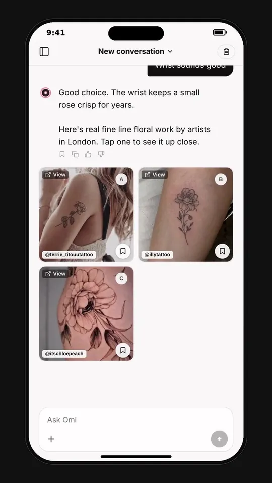 Omi helping a client shape a tattoo idea